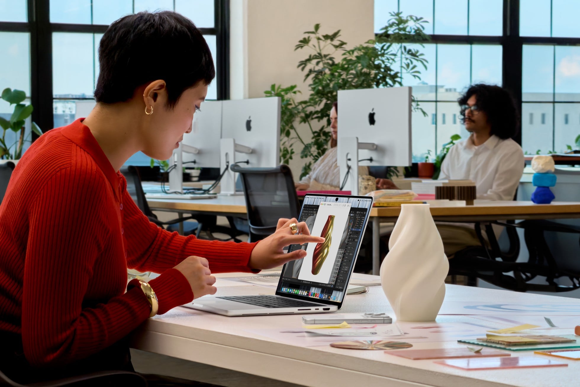 MacBook Pro with the ProLED XDR display come in two sizes: 14" and 16". (Apple)