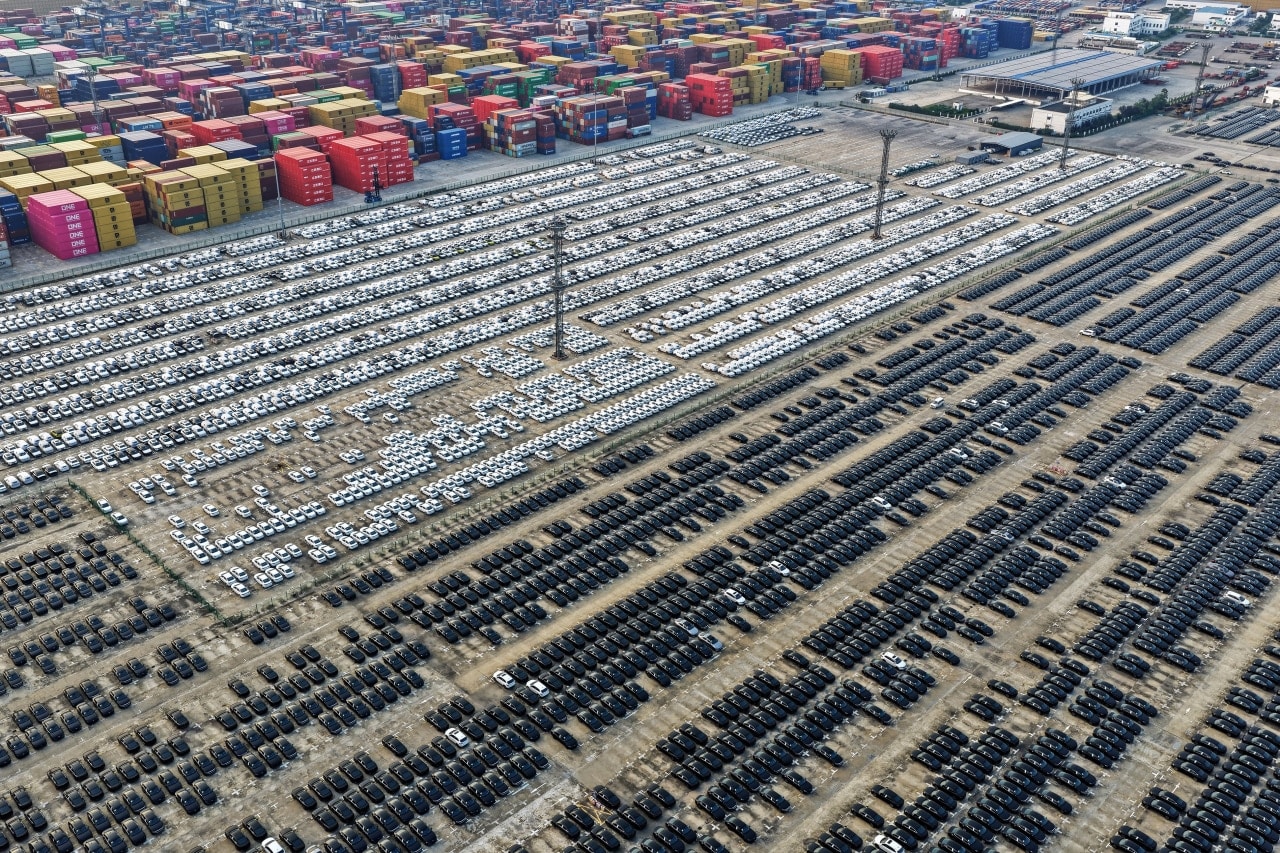 Chinese-made vehicles awaiting export at a port in Nanjing in 2025. Chinese-made vehicles awaiting export at a port in Nanjing in 2025.