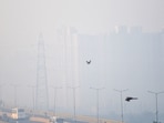 A thick layer of smog blankets the New Link Road bridge in Ghaziabad on Wednesday morning, amid poor air quality in the Delhi-NCR region.(Sakib Ali/ HT Photo/ Representational)
