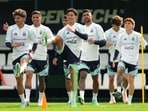 Argentina' s Julián Álvarez, left, and Lisandro Martinez, center, train with their team for an international friendly soccer match against Bolivia in Buenos Aires, Argentina, Sept. 29, 2026. 