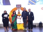 Zetwerk co-founder and CEO Amrit Acharya with his family on the NSE stage. 