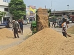Paddy procurement in progress in a grain market on Wednesday. (HT Photo)