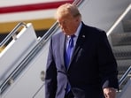 U.S. President Donald Trump departs Air Force One as he arrives at Charlotte Douglas International Airport on October 29.(Getty Images via AFP)