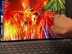 Apple’s first touch-screen laptop is a $2,899-and-up MacBook Pro with an OLED display.