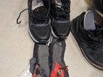 officials became suspicious after noticing that the black sports shoes he was wearing had unusually thick soles and appeared heavier than normal. (HT)