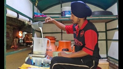 A dairy owner pouring milk into a container in Ludhiana on Thursday. (Gurpreet Singh/HT)
