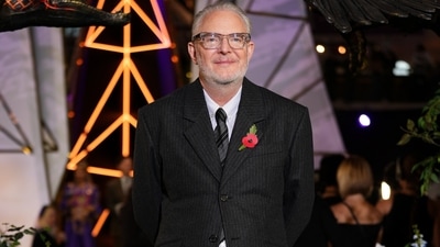 Director Francis Lawrence poses for photographers upon arrival at The Hunger Games: Sunrise on the Reaping UK fan screening at the HMV Westfield Shopping Centre in London.&nbsp; (AP Photo/Scott A Garfitt)