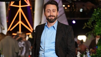 Kieran Culkin, who plays a younger Caesar Flickerman in the prequel film The Hunger Games: Sunrise on the Reaping, opted for a subtle sequin-embellished, thread-embroidered jacket for the red carpet event. He styled it with a blue shirt and matching pants.&nbsp; (AP Photo/Scott A Garfitt)