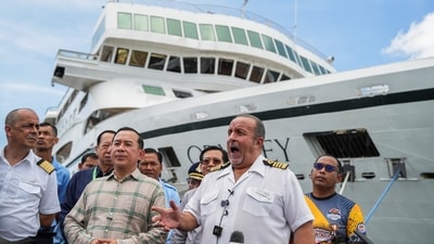 Captain Emanuele Giudice of the Villa Vie Odyssey cruise ship speaks to media near the vessel, which is docked at Sihanoukville Autonomous Port, after permanent residents living aboard the vessel were forced to disembark in Cambodia. (REUTERS)