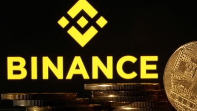 Representations of cryptocurrencies are seen in front of displayed Binance logo in this illustration taken November 10. (REUTERS)