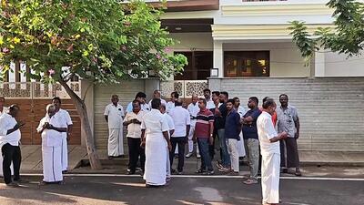 DMK cadres outside party leader KN Nehru’s residence as the Directorate of Vigilance and Anti-Corruption (DVAC) conducted a search at the premises in Tiruchirappalli (or Trichy) on Thursday. (ANI Video Grab) DMK cadres outside party leader KN Nehru’s residence as the Directorate of Vigilance and Anti-Corruption (DVAC) conducted a search at the premises in Tiruchirappalli (or Trichy) on Thursday. (ANI Video Grab)