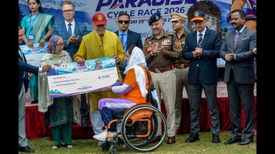 J&K LG Manoj Sinha presents an award to a winner of 'Pedal Through Paradise Cycle Race 2026', in Srinagar on Thursday. (PTI) J&K LG Manoj Sinha presents an award to a winner of 'Pedal Through Paradise Cycle Race 2026', in Srinagar on Thursday. (PTI)
