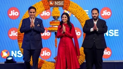 Jio Platforms Managing Director Akash Ambani, Jio Platforms Limited Non-Executive Directors Anant Ambani and Isha Ambani during the bell-ringing ceremony on the day of the listing of company during its IPO. (PTI) Jio Platforms Managing Director Akash Ambani, Jio Platforms Limited Non-Executive Directors Anant Ambani and Isha Ambani during the bell-ringing ceremony on the day of the listing of company during its IPO. (PTI)