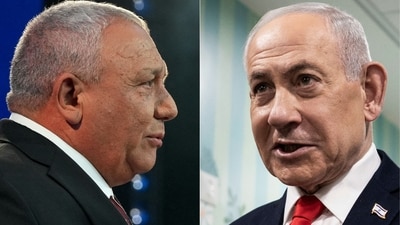This combination of pictures created on October 28, 2026, shows
Yashar party leader Gadi Eisenkot (L) addressing his supporters at the election night rally in Tel Aviv early on October 28, 2026, and Prime Minister Benjamin Netanyahu speaking to the media after voting in Jerusalem on October 27, 2026.