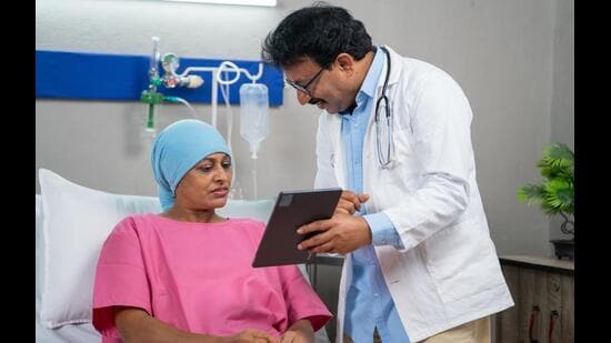 A cancer diagnosis should not also be a sentence of debt. (Shutterstock)