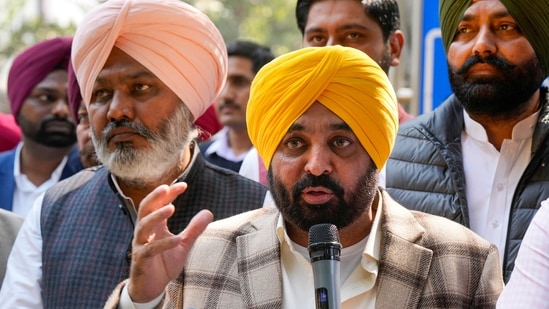 Punjab Chief Minister Bhagwant Mann with AAP MLAs talks to the media.