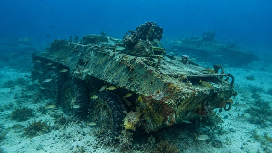 A 2014 project repurposed 36 obsolete armored vehicles as artificial reef material off South Carolina. The vehicles joined a partnership’s hundreds of previous deployments, which had created more than 1.12 million cubic feet of reef habitat since 1997. Officials also cited tourism and recreation benefits. (AI-generated/ChatGPT)