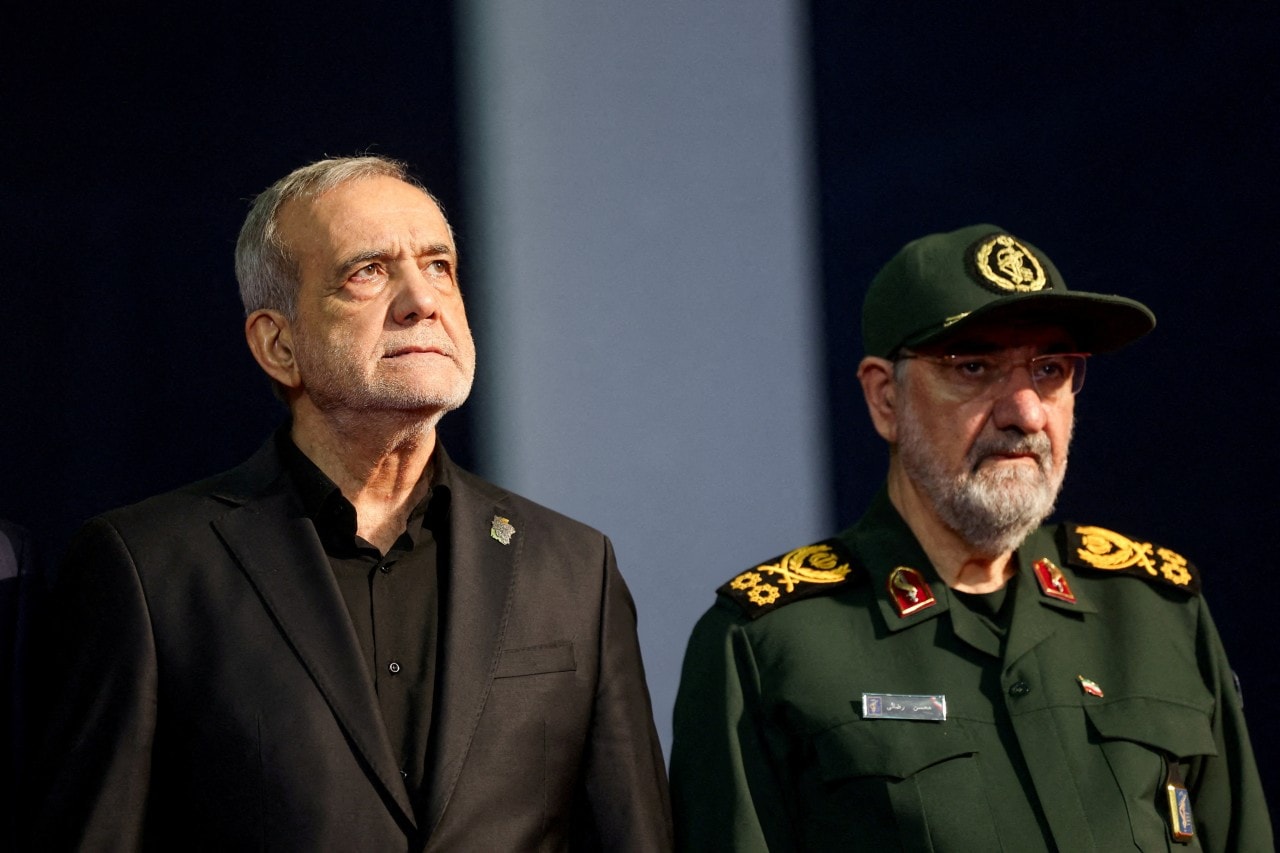 Iranian President Masoud Pezeshkian with senior security official Mohsen Rezaei, in July.