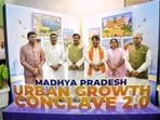 Madhya Pradesh Chief Minister Mohan Yadav poses for a group photo at the Madhya Pradesh Urban Growth Conclave 2.0 at Brilliant Convention Centre, in Indore on Wednesday.
