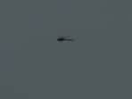 A view of a flying helicopter that is currently missing, travelling from Badrinath to Dehradun, in Chamoli on Friday. Search operation underway by the district administration team.