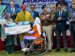 J&K LG Manoj Sinha presents an award to a winner of 'Pedal Through Paradise Cycle Race 2026', in Srinagar on Thursday. (PTI)