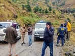 Chamoli: SDRF and other security personnel conduct a search and rescue operation at the site after a helicopter carrying six people on board crashed.