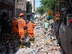 Preliminary local inquiries have indicated that demolition work with heavy machinery at an adjoining unauthorised construction site may have triggered the collapse through vibrations. 