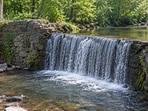 Pennsylvania removed the 7-foot Lochner Dam in 2006, but a downstream barrier continued to block migratory fish. The project was part of a broader national trend: 2,119 dams were removed from 1912 to 2023, including 390 in Pennsylvania.(AI-generated/ChatGPT)