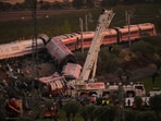 Emergency services work at the scene of a collision between two trains in Urda, Spain, on Wednesday, Oct. 28, 2026. (AP Photo/Manu Fernandez)