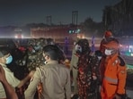 The joint team of Lucknow police, NDRF, SDRF and locals at the spot . (HT)