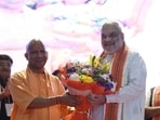 Union home minister Amit Shah being welcomed by Uttar Pradesh chief minister Yogi Adityanath at the BJP state working committee meeting in Lucknow on Friday. (Deepak Gupta/HT Photo)