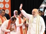 Union home minister Amit Shah greets party leaders as he arrives to attend the BJP’s state working committee meeting in Lucknow on Friday. (Deepak Gupta/HT Photo)