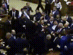 Several purported videos from inside Parliament surfaced on social media, showing lawmakers engaging in physical confrontations, exchanging punches and throwing chairs at one another.