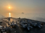 An E/A-18G takes off from the USS George Washington. Eve Hartley/WSJ