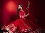 Sonali Bendre shares her Karwa Chauth look in a richly detailed red anarkali. 