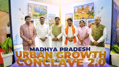 Madhya Pradesh Chief Minister Mohan Yadav poses for a group photo at the Madhya Pradesh Urban Growth Conclave 2.0 at Brilliant Convention Centre, in Indore on Wednesday. (@DrMohanYadav51 X) Madhya Pradesh Chief Minister Mohan Yadav poses for a group photo at the Madhya Pradesh Urban Growth Conclave 2.0 at Brilliant Convention Centre, in Indore on Wednesday. (@DrMohanYadav51 X)