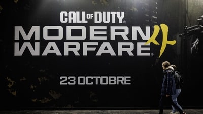 Visitors walks past a Call Of Duty Modern Warfare 4 placard during the preview night of Paris Games Week 2026 in Paris. (AFP)