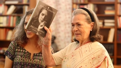 Sonia Gandhi, right, during the unveiling of her upcoming book 'Belonging: A Journey of Love' (AICC) Sonia Gandhi, right, during the unveiling of her upcoming book 'Belonging: A Journey of Love' (AICC)