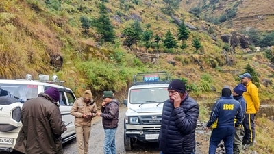 Chamoli: SDRF and other security personnel conduct a search and rescue operation at the site after a helicopter carrying six people on board crashed. (PTI)