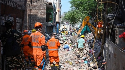 Preliminary local inquiries have indicated that demolition work with heavy machinery at an adjoining unauthorised construction site may have triggered the collapse through vibrations. (Hindustan Times/ Representative) Preliminary local inquiries have indicated that demolition work with heavy machinery at an adjoining unauthorised construction site may have triggered the collapse through vibrations. (Hindustan Times/ Representative)