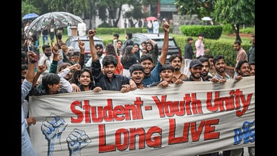 Students of Jamia Millia Islamia celebrate their victory during a march inside the university campus on Friday. (Sanchit Khanna/HT Photo)