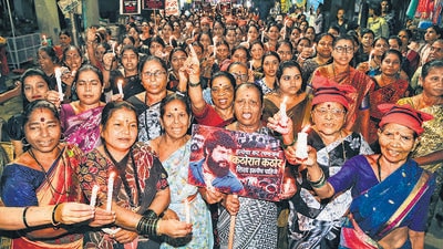 Thane: Residents of Kasarvadavali village participate in a candle march on Ghodbunder Road, in Thane, Friday, Oct. 30, 2026. The demonstration was organized in support of the family of Shiv Sena (Uddhav Balasaheb Thackeray) leader Pradeep Purnekar, seeking swift justice following his murder on September 29. (PTI Photo)(PTI10_30_2026_000415A) (PTI) Thane: Residents of Kasarvadavali village participate in a candle march on Ghodbunder Road, in Thane, Friday, Oct. 30, 2026. The demonstration was organized in support of the family of Shiv Sena (Uddhav Balasaheb Thackeray) leader Pradeep Purnekar, seeking swift justice following his murder on September 29. (PTI Photo)(PTI10_30_2026_000415A) (PTI)