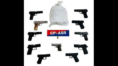 Three separate cases under the Arms Act and NDPS Act have been registered, officials said. (HT) Three separate cases under the Arms Act and NDPS Act have been registered, officials said. (HT)