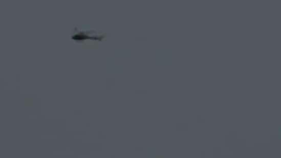 A view of a flying helicopter that is currently missing, travelling from Badrinath to Dehradun, in Chamoli on Friday. Search operation underway by the district administration team.