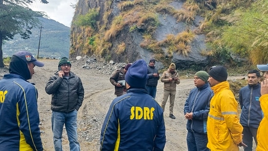 SDRF and other security personnel conduct a search and rescue operation at the site after a helicopter carrying six people on board, including the pilot, crashed into a hillside near Joshimath, about an hour after it took off from Badrinath on its way to Dehradun, in Chamoli district, Uttarakhand, Friday, Oct. 30, 2026. SDRF and other security personnel conduct a search and rescue operation at the site after a helicopter carrying six people on board, including the pilot, crashed into a hillside near Joshimath, about an hour after it took off from Badrinath on its way to Dehradun, in Chamoli district, Uttarakhand, Friday, Oct. 30, 2026.