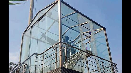 The damaged glass enclosure of Dr BR Ambedkar statue at Jalandhar Bypass in Ludhiana on Friday. (HT)
