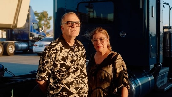 John Jauregui and Jackie Jauregi at a lot of their Triways trucking company. in Southern California.