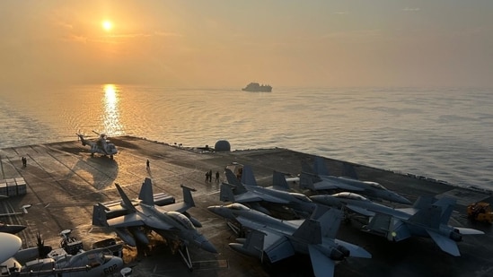 An E/A-18G takes off from the USS George Washington. Eve Hartley/WSJ