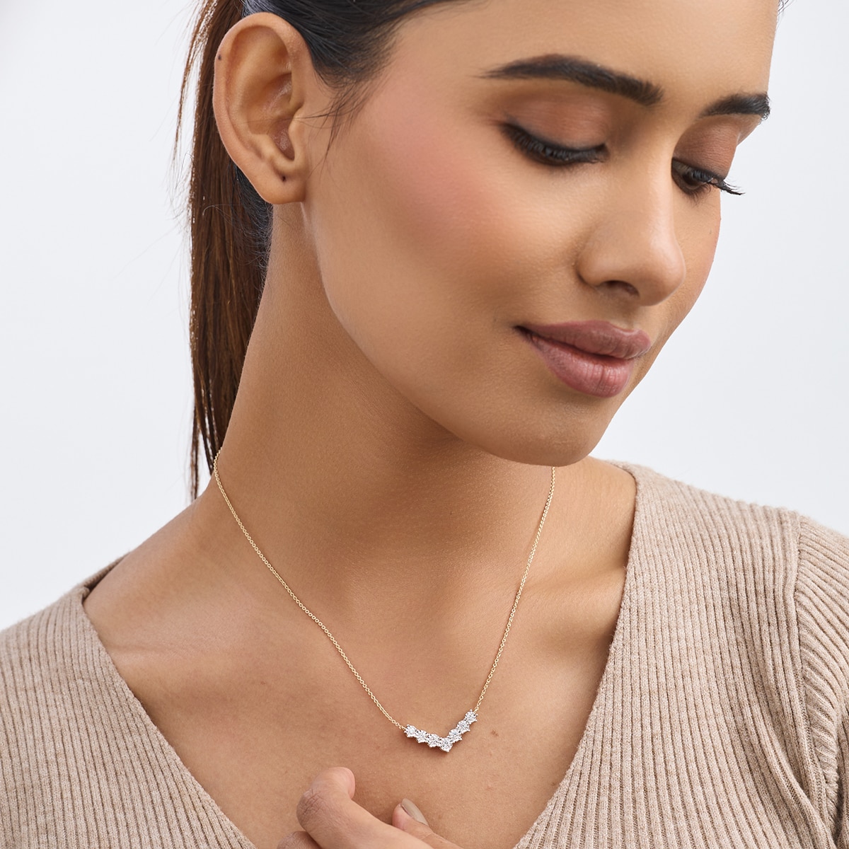 A delicate pendant necklace can be worn on its own for a subtle finish or layered with finer chains for a more considered look, (Keemti Jewel) A delicate pendant necklace can be worn on its own for a subtle finish or layered with finer chains for a more considered look, (Keemti Jewel)