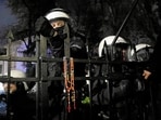 Police stand guard during a protest outside the premises of Poland's Constitutional Tribunal after the tribunal said on its website that the tribunal's president Bogdan Swieczkowski, who was a deputy justice minister under the Law and Justice (PiS) government, had been suspended on Friday, in Warsaw, Poland, October 30, 2026. Agencja Wyborcza.pl/via REUTERS   ATTENTION EDITORS - THIS IMAGE WAS PROVIDED BY A THIRD PARTY. POLAND OUT. NO COMMERCIAL OR EDITORIAL SALES IN POLAND.